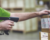 man organising warehouse storage