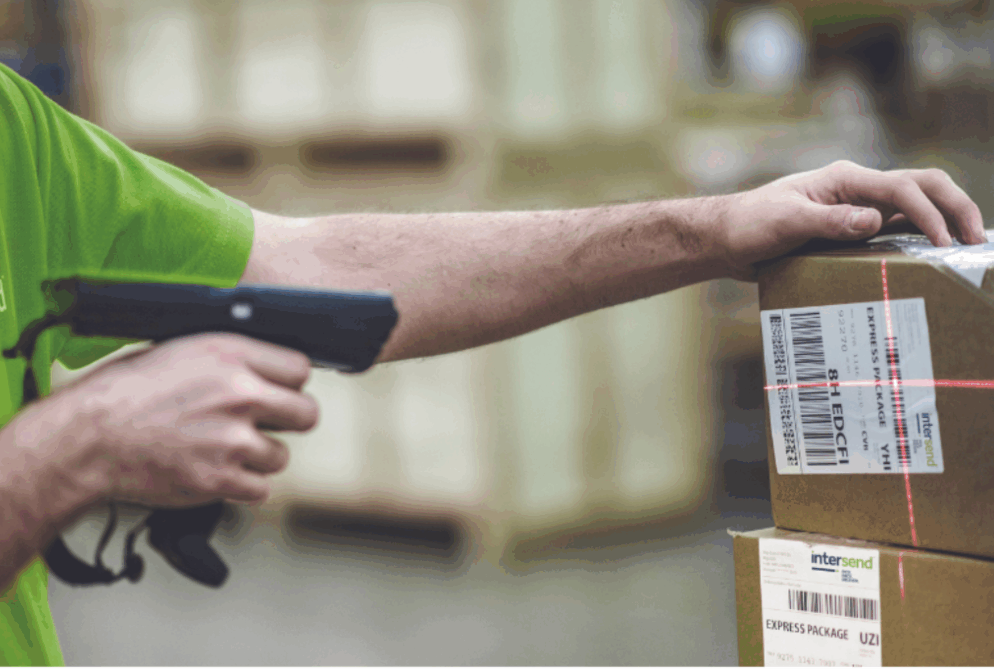 man organising warehouse storage