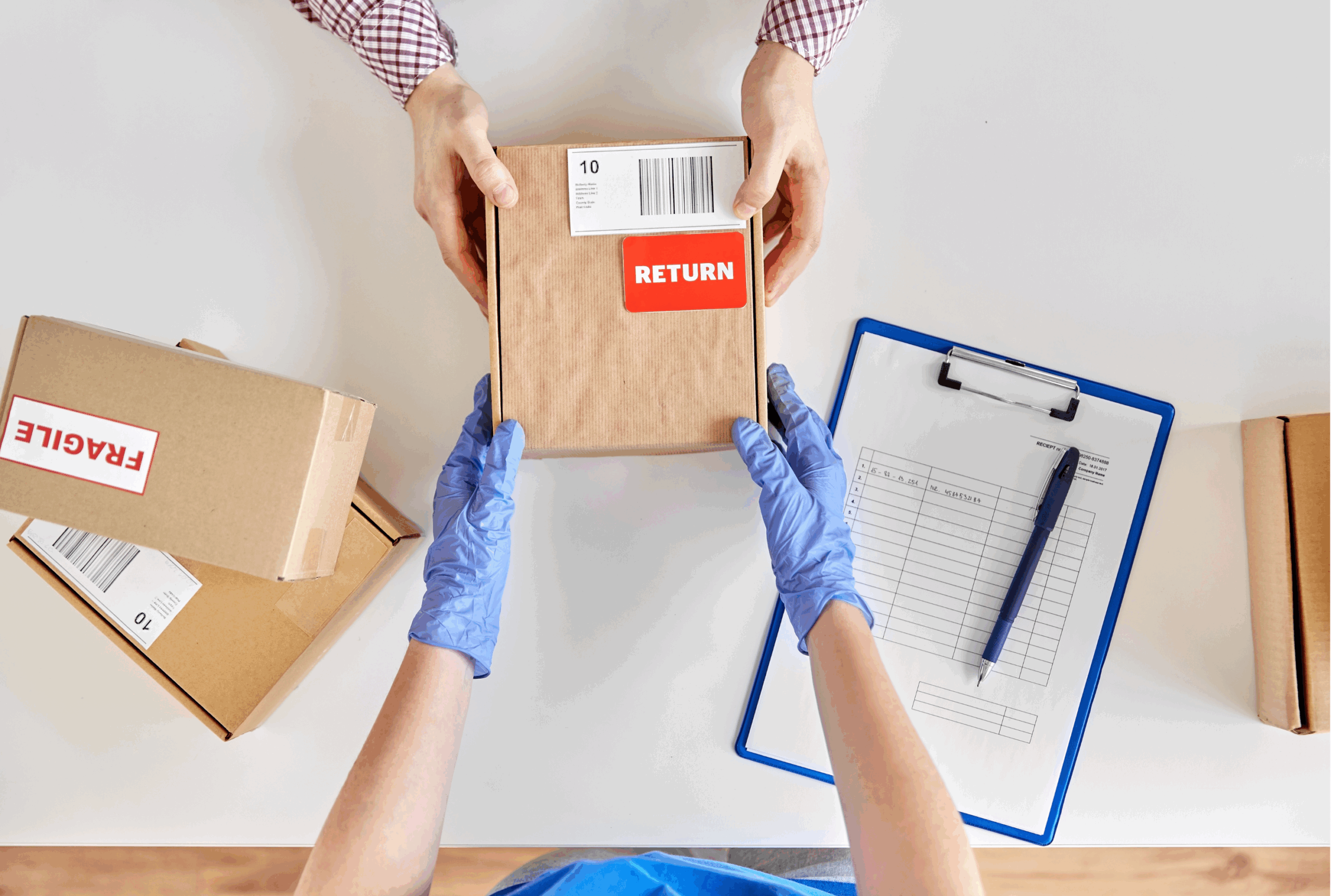 Hands on a returns box