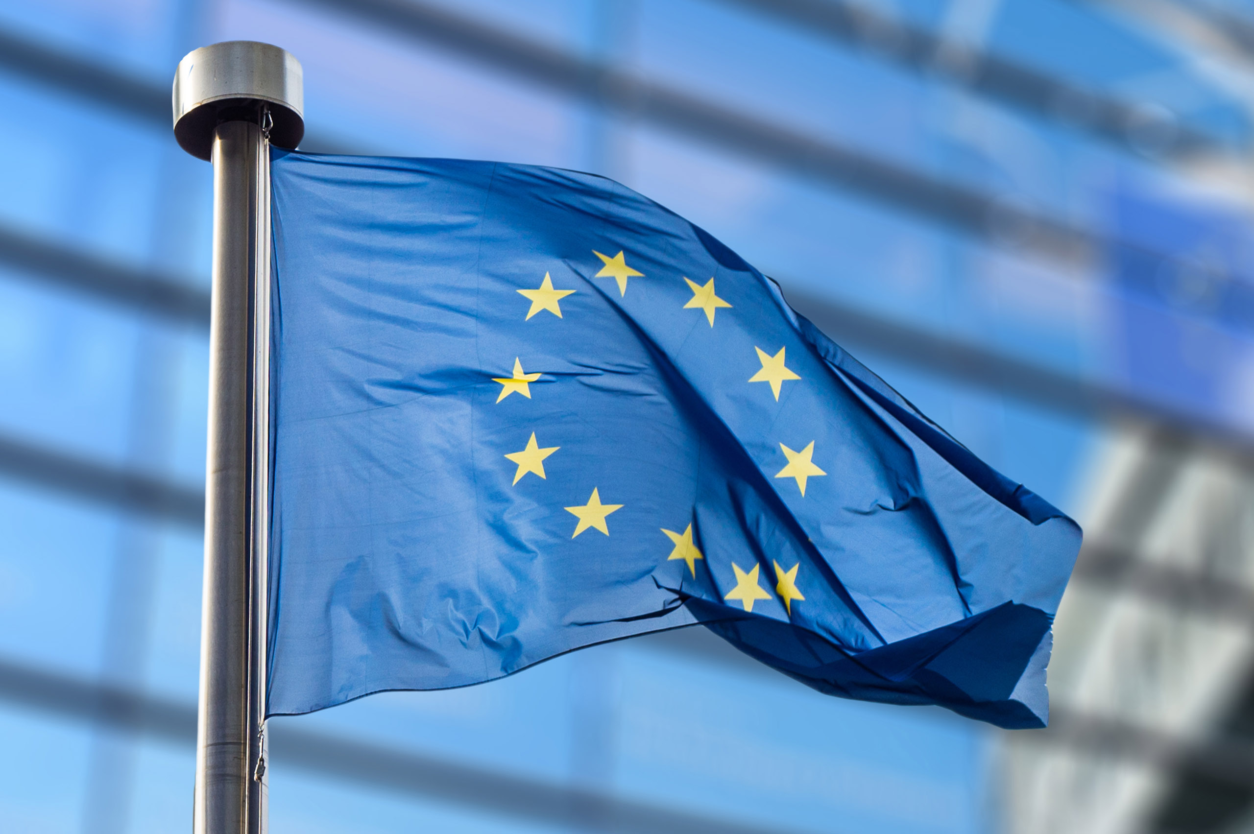 European Union flag against European Parliament